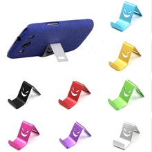 Cute Portable Metal Cell Phone Holder Devil Smile Smart Phone Stander Mini Moblie Phone Universal Bracket (Random Color)